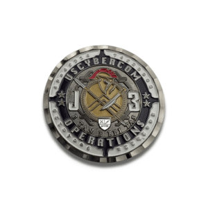 Custom metal challenge coin with an antique silver finish, black enamel, a central crossed-tool emblem, and raised lettering on a white background.