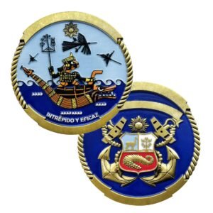 Front and reverse of a gold-tone naval challenge coin with a warrior boat scene, blue enamel, crossed anchors and a central shield.